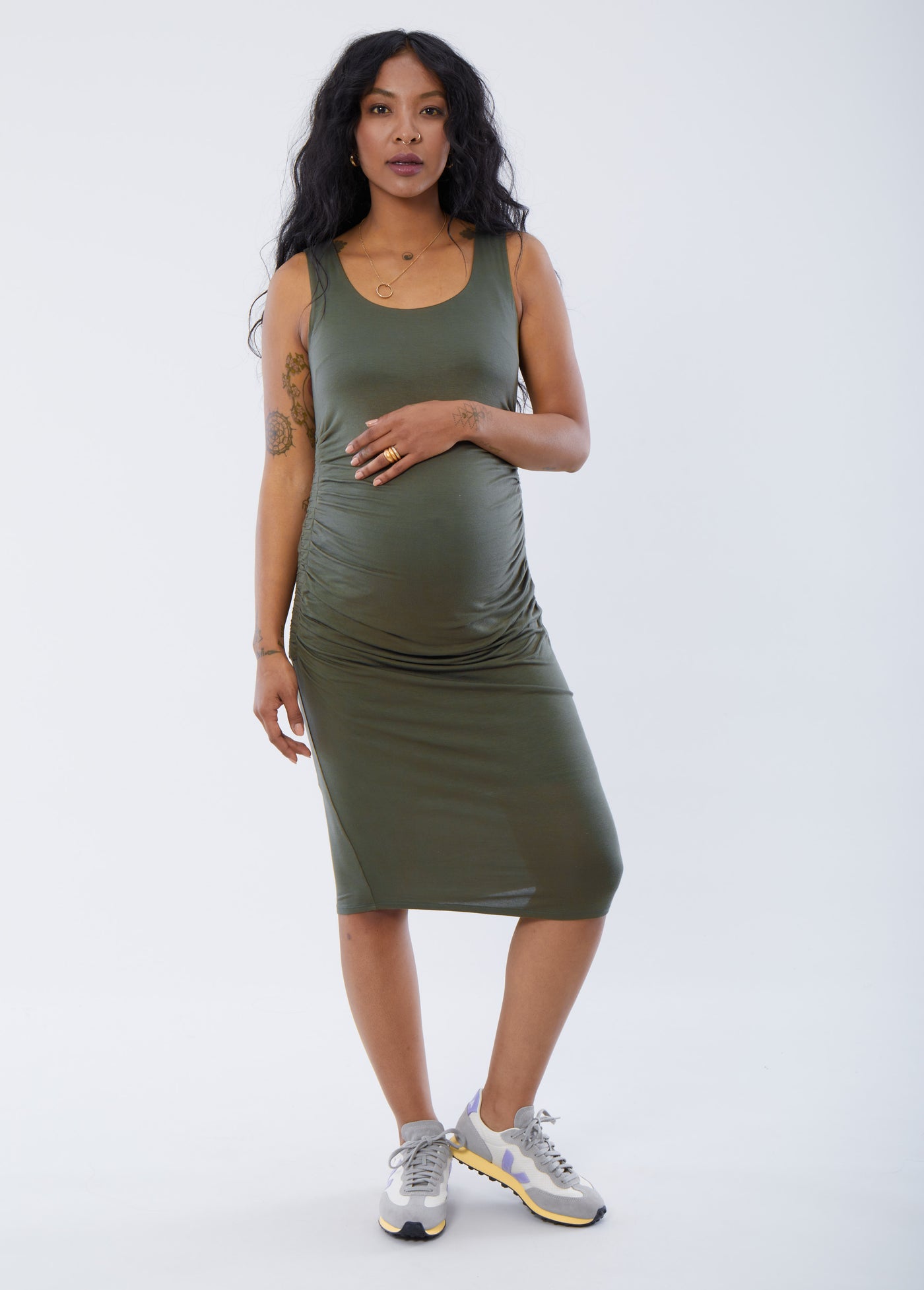 Synmia is 7 months pregnant, 5'10", wearing a size small||Olive