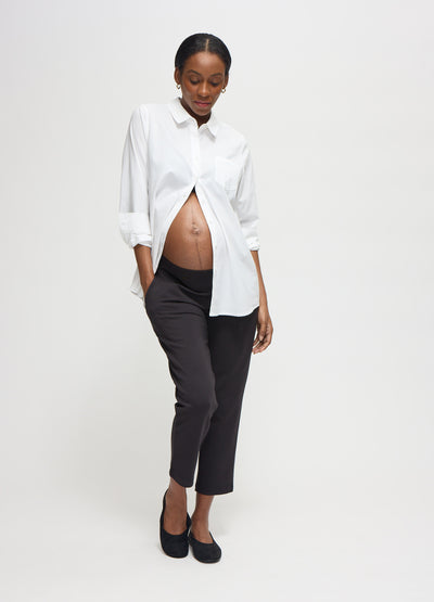 AJ is 6 months pregnant and wearing a size Small || white
