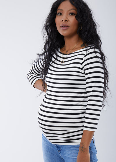 Synmia 5'10", 7 months pregnant, and wearing size small||Stripe