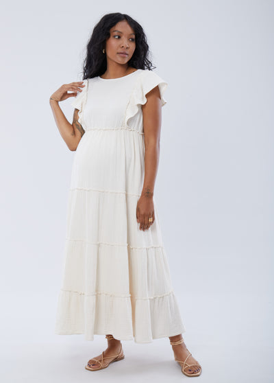 Synmia is 7 months pregnant, 5'10", wearing a size small||White