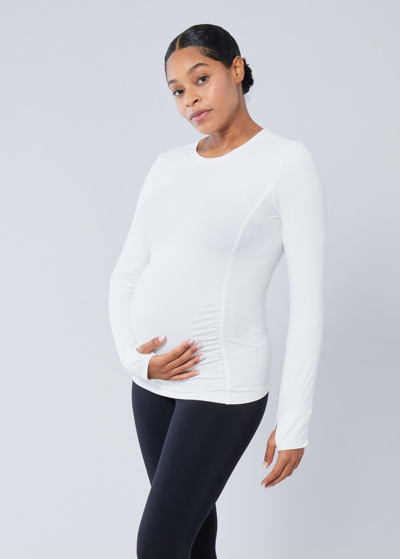 Jasmine is 5’7”, 8 months pregnant and wearing a size small||White