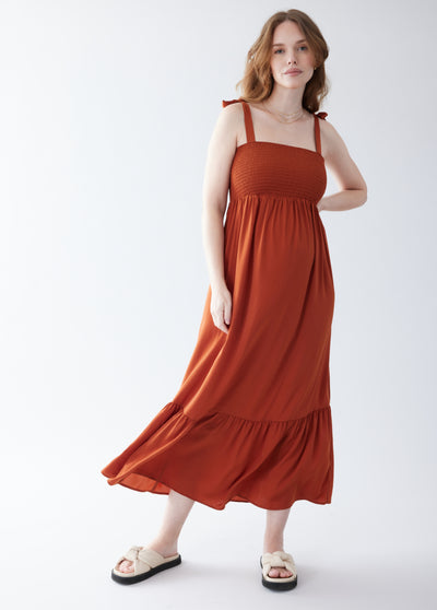 Maria is 5’8”, 22 weeks pregnant, and wearing size small||Spice